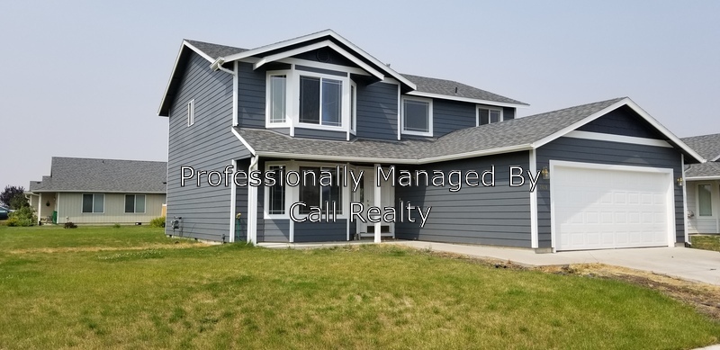 7024 S Mudlen St in Cheney, WA - Foto de edificio