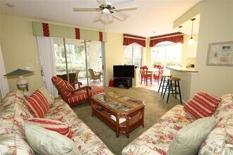 24833 Lakemont Cove Ln-Unit -104 in Bonita Springs, FL - Foto de edificio - Building Photo