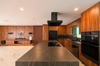 3711 Battersea Rd in Miami, FL - Building Photo - Building Photo