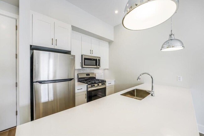 property at 667-665 Grand St
