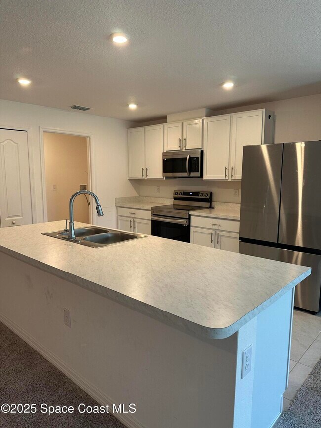 3227 Torrence Ave SE in Palm Bay, FL - Building Photo - Building Photo