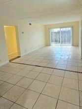 1501 Crescent Cir, Unit E44 in West Palm Beach, FL - Building Photo - Building Photo