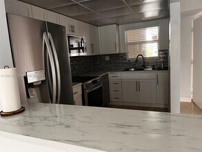 210 NW 87th Ave, Unit L218 in Miami, FL - Foto de edificio - Building Photo