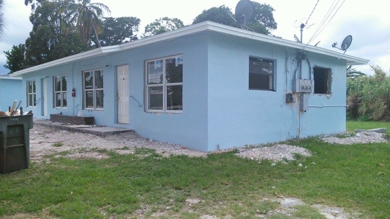 Lakeshore Apartments in Canal Point, FL - Building Photo