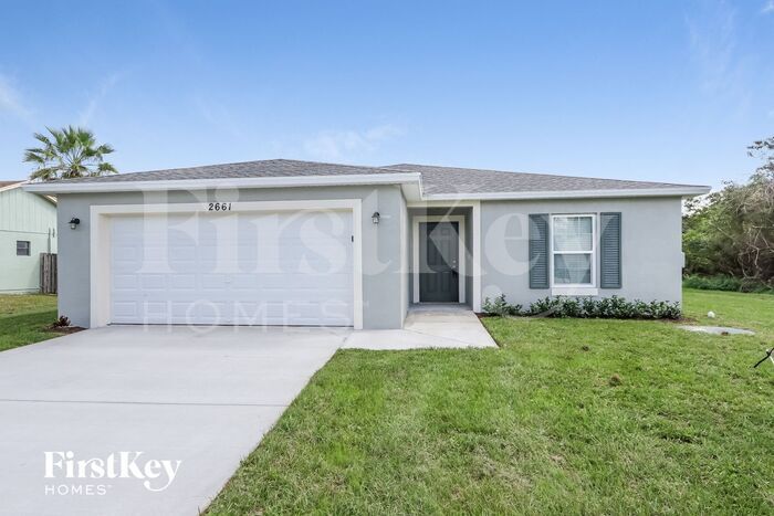 2661 SW Eastman St in Port St. Lucie, FL - Building Photo