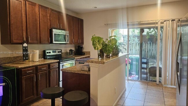 5906 Woodlands Blvd-Unit -3650 in Tamarac, FL - Building Photo - Building Photo