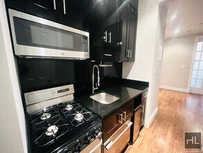 MOTT ST., Unit 12 in New York, NY - Building Photo - Building Photo