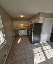 1029-1031 SW Kingscross Rd in Blue Springs, MO - Building Photo - Building Photo