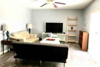 6447 SE Windsong Ln in Stuart, FL - Building Photo - Building Photo