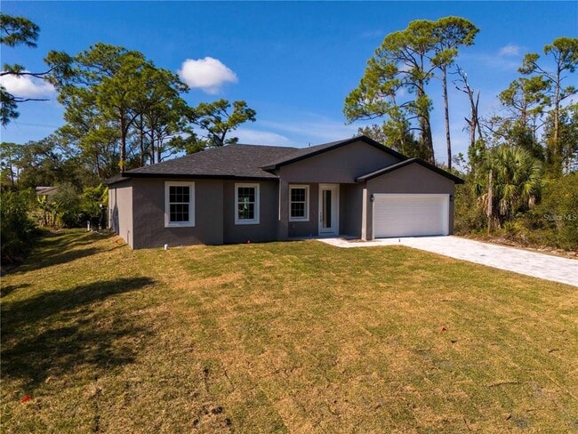 49 Santa Fe St in Port Charlotte, FL - Building Photo - Building Photo