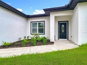 2054 Kendis St in Port Charlotte, FL - Building Photo - Building Photo