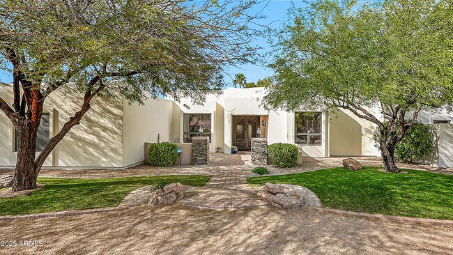 property at 10390 E Paradise Dr