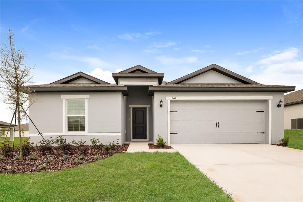 1361 Brenway Dr in Mascotte, FL - Building Photo