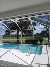 11574 Quail Village Way in Naples, FL - Foto de edificio - Building Photo