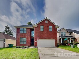 963 Oak Lynn Dr in Willis, TX - Building Photo