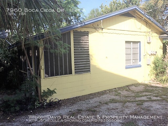 7960 Boca Ciega Dr-Unit -Unit A in St Pete Beach, FL - Building Photo - Building Photo