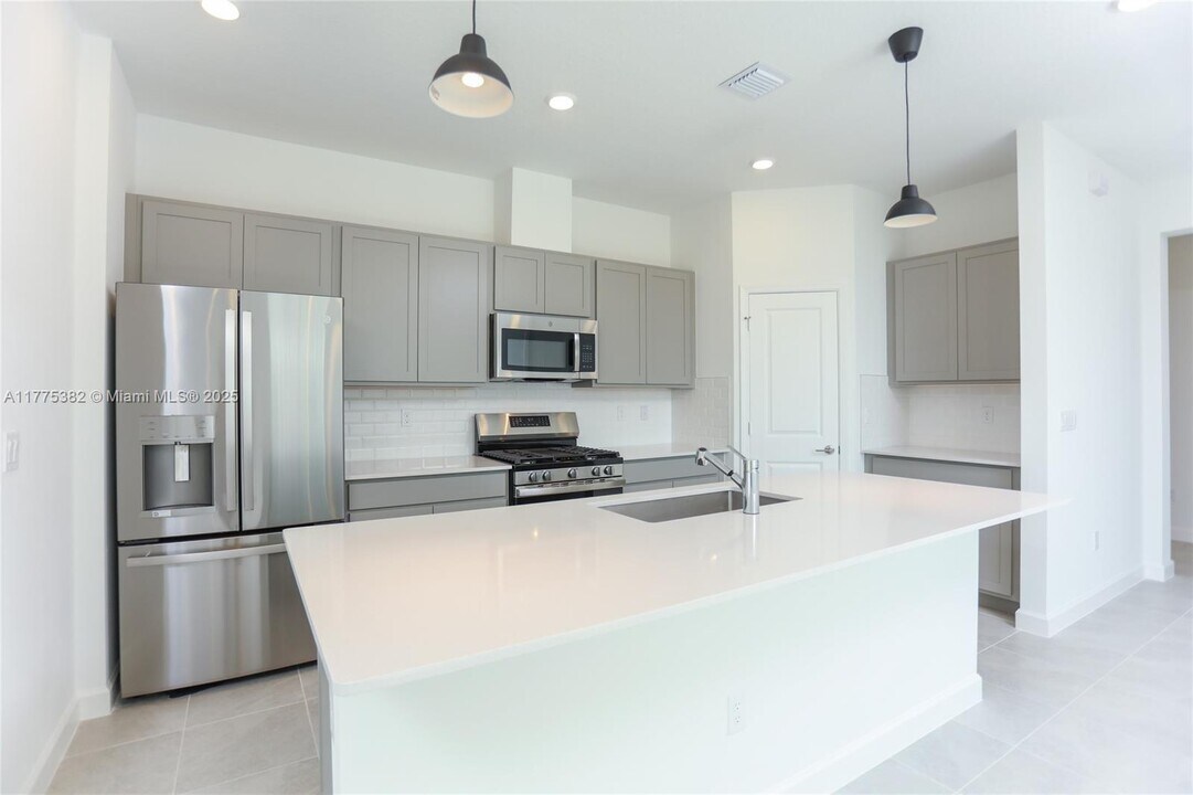 1470 Tangled Orch Trce in Loxahatchee, FL - Building Photo