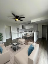 7406 S Hoover St in Los Angeles, CA - Building Photo - Building Photo