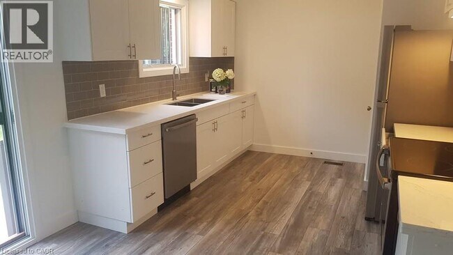 property at 203 Erb St E