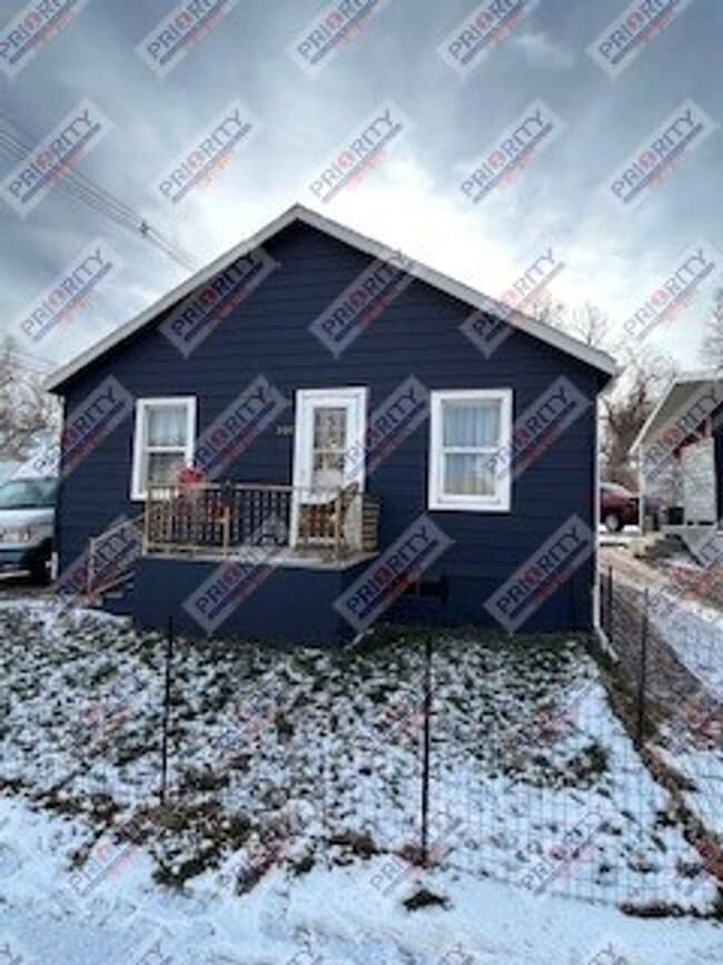 property at 307 W 3rd St