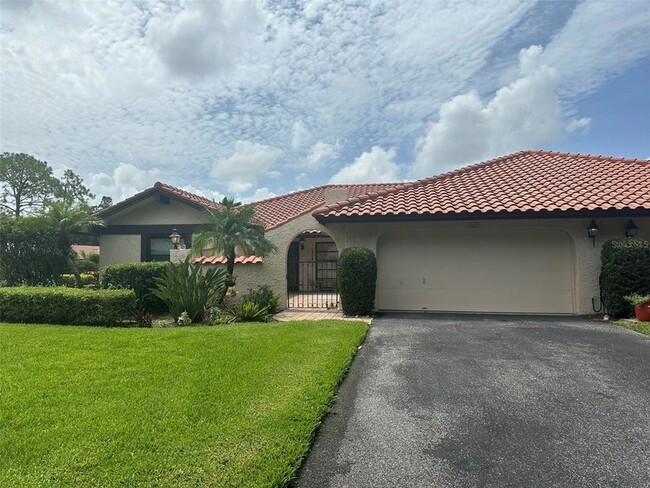 7260 Golf Pointe Way, Unit 6400C203 in Sarasota, FL - Building Photo - Building Photo