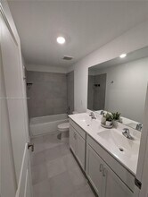 6001 Woods Edge Cir in Riviera Beach, FL - Building Photo - Building Photo