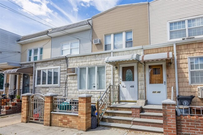property at 68-48 78th St