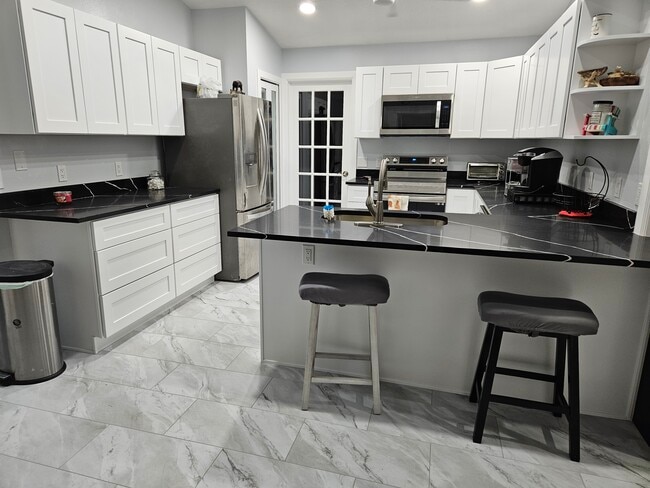 5712 Sweetheart Ct in St. Cloud, FL - Foto de edificio - Building Photo