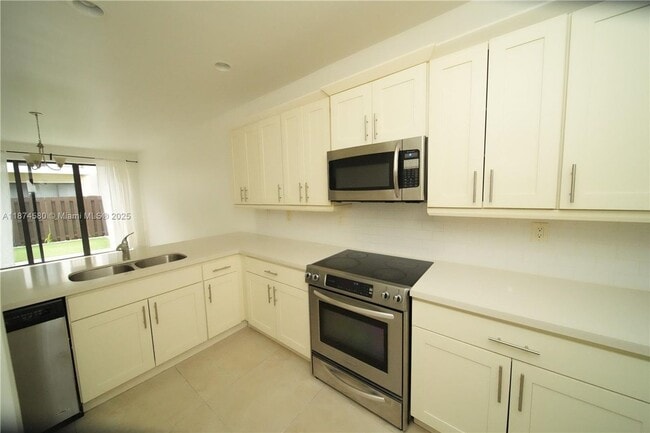 property at 10457 NW 61st St