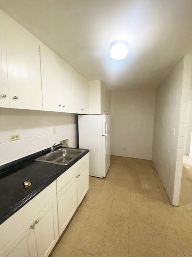 property at 94-245 Leowahine St