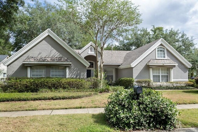 property at 1407 Whispering Woods Way