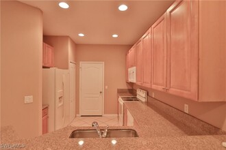 10240 Olivewood Way in Estero, FL - Foto de edificio - Building Photo