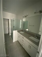 7646 Rockefeller Dr in Naples, FL - Building Photo - Building Photo