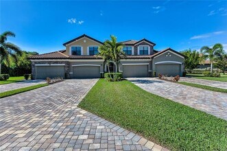 9512 Napoli Ln, Unit 101 in Naples, FL - Building Photo - Building Photo