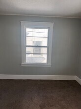 3718 E 59th St-Unit -Down XXX in Cleveland, OH - Building Photo - Building Photo