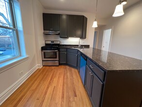 6018 N Melvina Ave, Unit Unit 2 in Chicago, IL - Foto de edificio - Building Photo