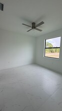 1103 Dean St E in Lehigh Acres, FL - Building Photo - Building Photo