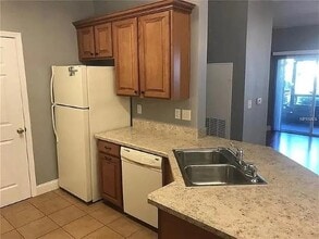 1995 Erving Cir, Unit 104 in Ocoee, FL - Foto de edificio - Building Photo