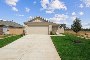323 Bush Mdw Ln in Magnolia, TX - Building Photo