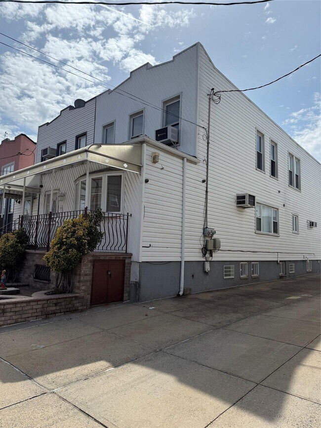 property at 66-18 75th St