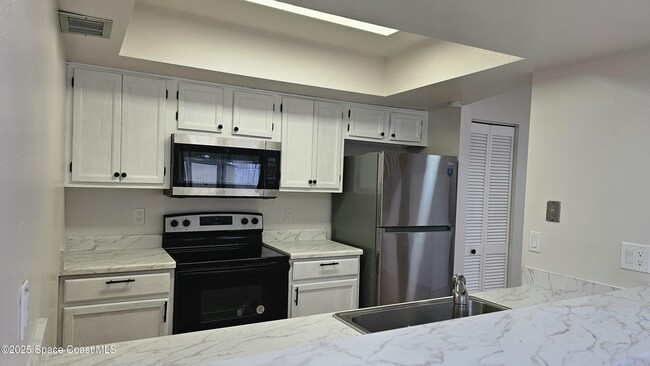 387 Knox McRae Dr in Titusville, FL - Building Photo - Building Photo