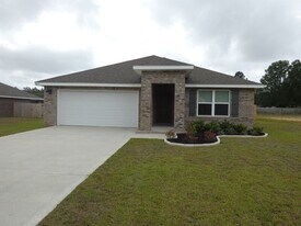 8617 Tarsus Dr in Milton, FL - Building Photo