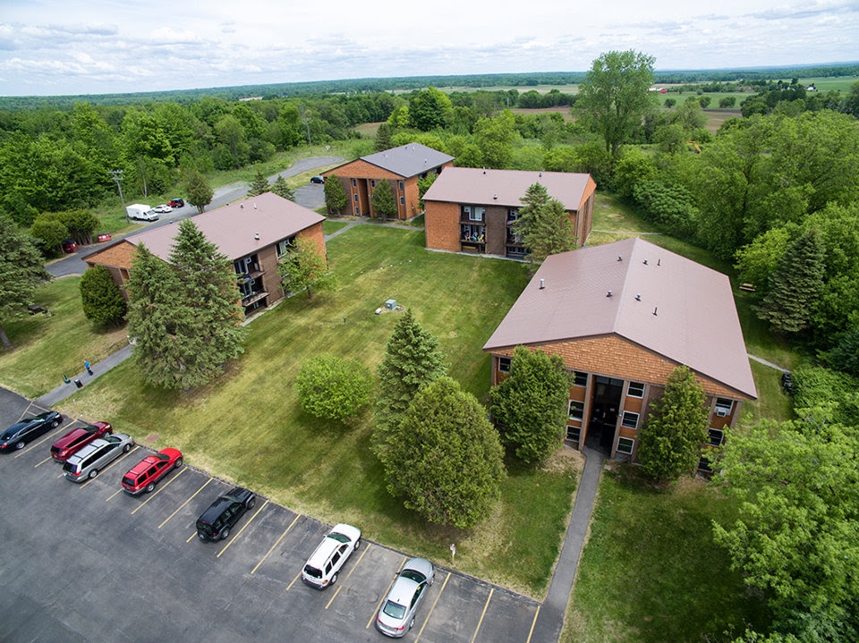 Whispering Woods Apartments in Carthage, NY - Building Photo