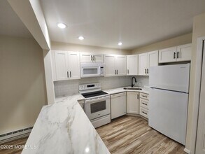 129 Amberly Dr in Englishtown, NJ - Building Photo - Building Photo