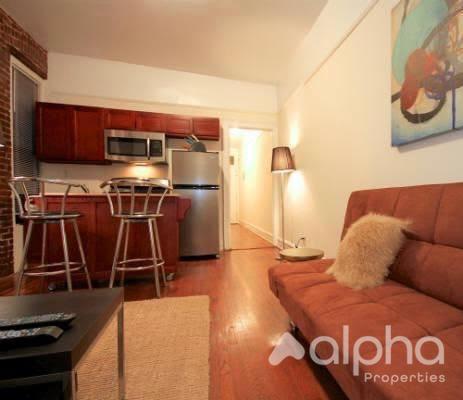 property at 211 E 14th St