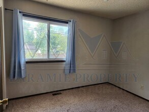 869 N 8th St in Laramie, WY - Building Photo - Building Photo