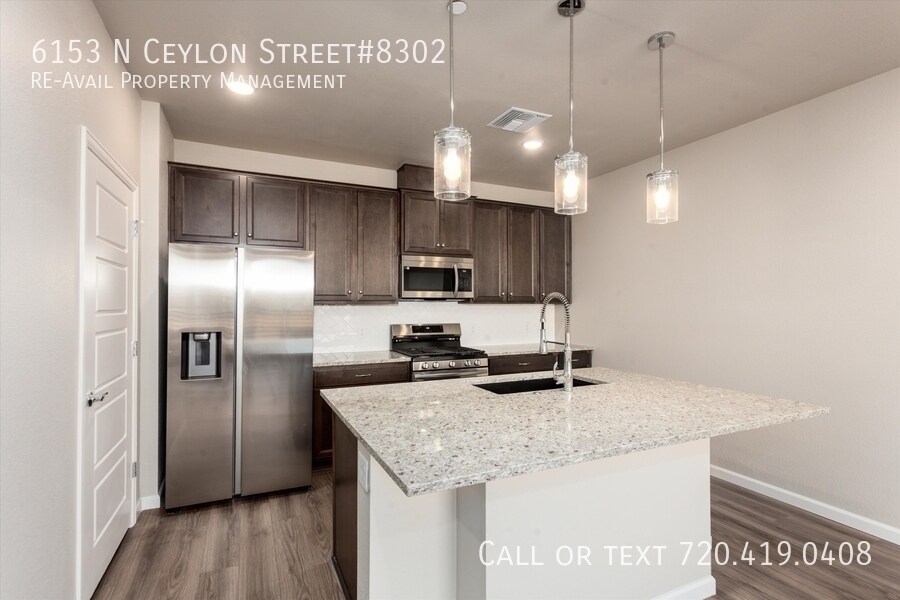 6153 N Ceylon St in Denver, CO - Building Photo