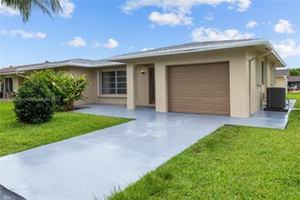 7312 NW 58th Ct in Tamarac, FL - Building Photo - Building Photo