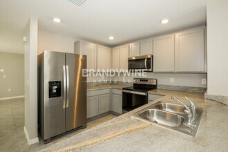 5488 Logan Cave Ave in Wimauma, FL - Building Photo - Building Photo