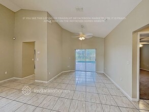 106 Quiet Oak Ct in Davenport, FL - Foto de edificio - Building Photo